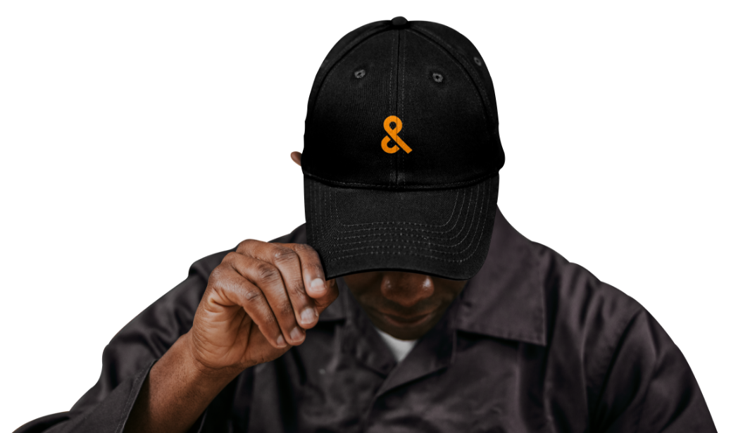 courier wearing chapman and peach branded hat